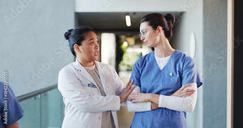 Canvas Print People, doctors and talking with sadness in hospital for staff shortage, treatment delay and mistake