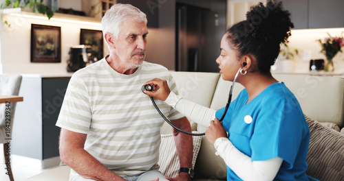 Tableau sur toile Doctor, old man and consultation in home with stethoscope for heart assessment, checkup and support