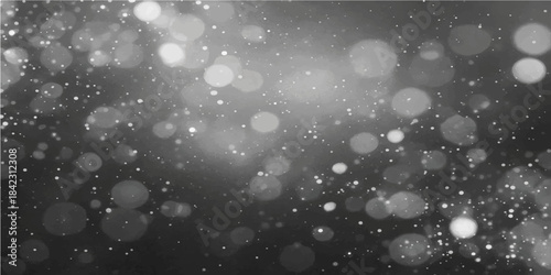 Blue bokeh blur of falling snow and magical winter light on a car window with raindrops, perfect for a Christmas or holiday design