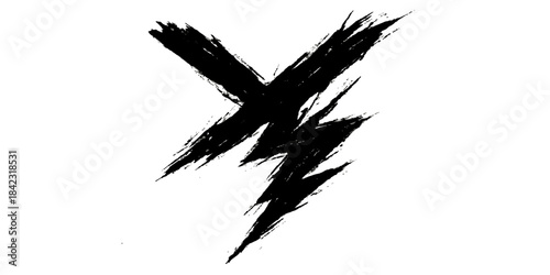 A person typing on a laptop with a blank screen on a wooden desk