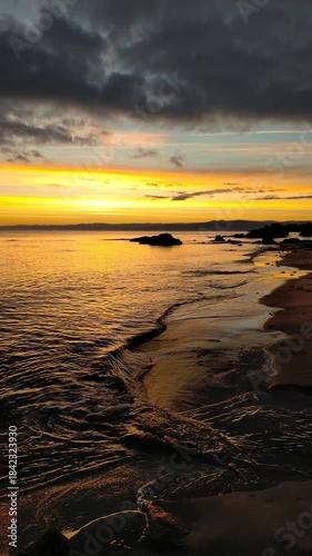 sunrise colors and waves at sunrise in the Cantabrian sea