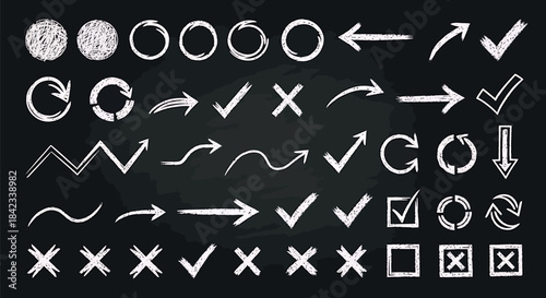 Hand-drawn white chalk symbols on blackboard background