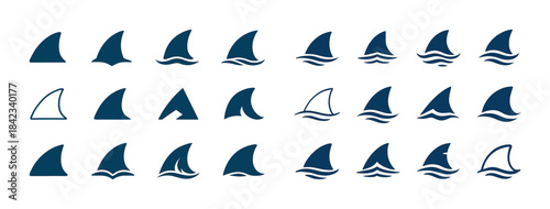 Set of various shark fin icons with wave patterns