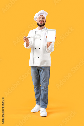 Male chef with blank tablet...