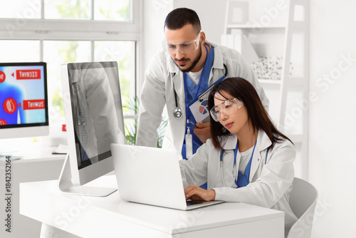 Doctors analyzing scientifi...