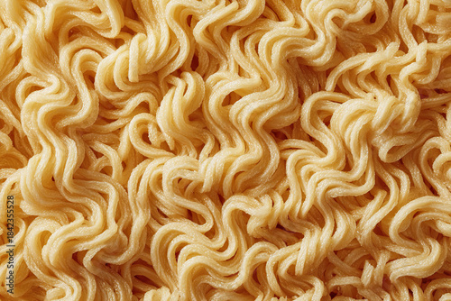 Close-up view of uncooked instant noodles with wavy texture