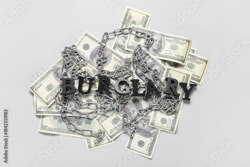 Word BURGLARY with chains a...