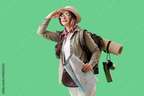 Female guide with map looki...