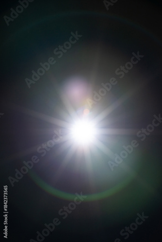Sun flare on the black background