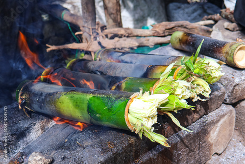 Bamboo chicken, chicken cooked in a bam boo stalk under fire. Also called Bongu chicken, a traditional south Indian food.