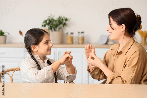 Little girl with her mother...