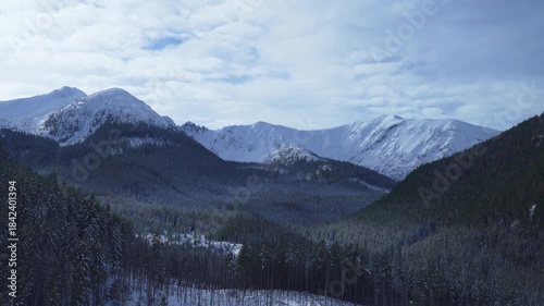 Rocks mountain peak snow winter coniferous forest Tatras Kaspravy up Poland