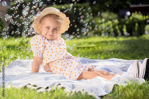 Cute little girl with soap ...