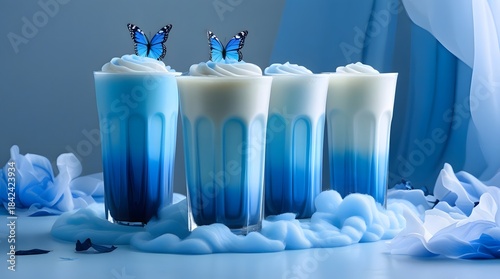 Stylish Blue Beverages with Butterflies and Whipped Cream Decoration