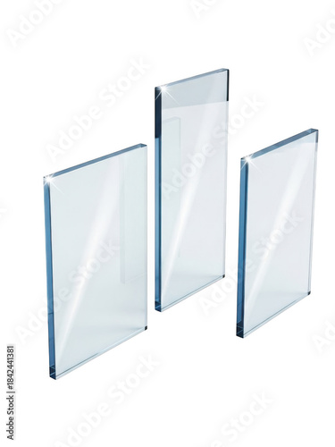 A minimalist composition of three different sized pieces of clear glass showcasing reflection and transparency