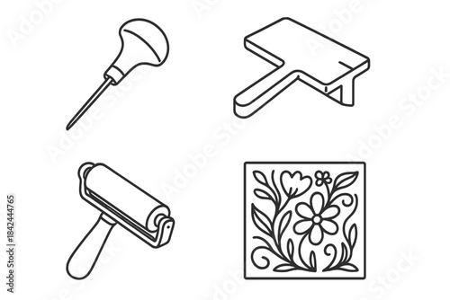 Printmaking tools and floral stamp block for linocut and woodcut art