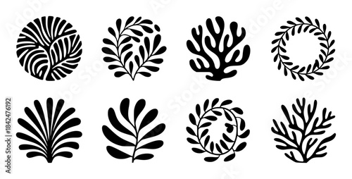 Eight distinct black leafy and coral decorative motifs white