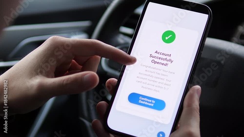 Modern banking at your fingertips, anywhere. This video shows a user in their car reviewing account terms, proceeding to open a bank account instantly via smartphone, and getting immediate