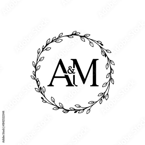 Elegant wedding monogram design with initials a&m encircled by a delicate leafy wreath isolated on transparent background