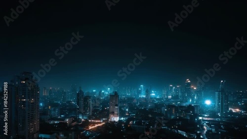 Wallpaper Mural Lightning streaks across the night sky above a dense city skyline, lighting up tall buildings. Torontodigital.ca