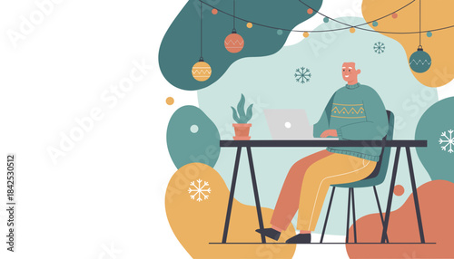 Mature man works remotely on a laptop at a festive winter desk with Christmas decorations