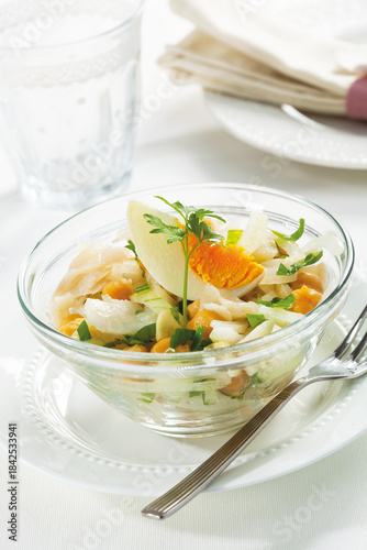 Vegetable salad with desalted cod and boiled egg