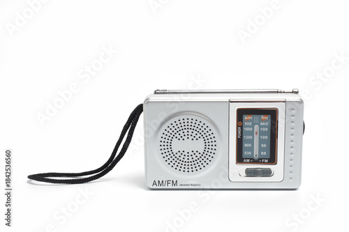 Portable battery-powered AM/FM radio photographed against a white background.