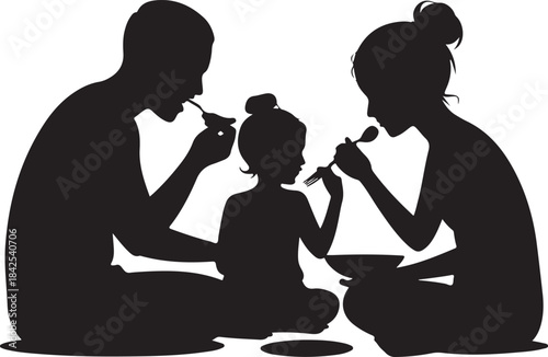 Family enjoying meal together with utensils
