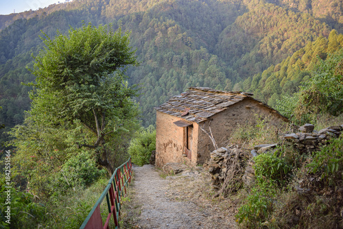 Mountain side village cow shed made of mud and stones.