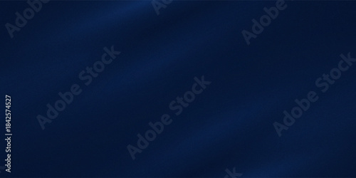 Silk satin fabric. Navy blue color. Abstract dark elegant background with space for design. Soft wavy folds.