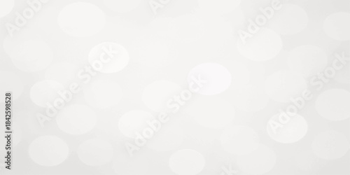 Abstract blue bokeh light background with glowing holiday glitter and shiny winter decoration