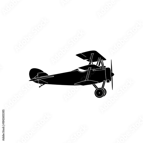 Classic Biplane Silhouette Flying Through the Sky.