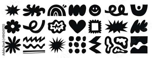 Abstract doodle elements with spirals, plants and wavy lines in naive style. Monochrome line art, hand drawn.