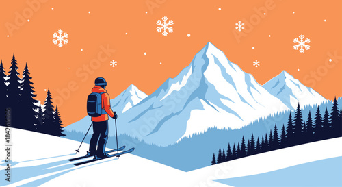 Skier standing on a snowy slope looking at a majestic mountain range under a beautiful orange sky during a winter snowfall.