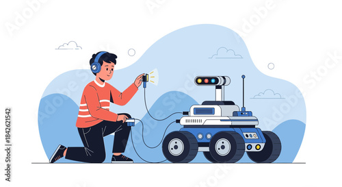 Boy engrossed in customizing his robot with electronic adjustments and focused concentration