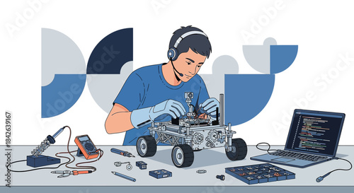 Engineering student passionately assembling robot model with technical equipment and code