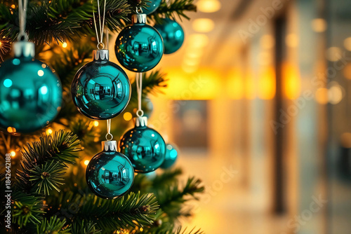 Elegant Christmas Tree with Shimmering Blue Ornaments and Warm Ambience