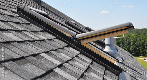 Attic Roof Skylight Open Windows on Asphalt Shingle Roof