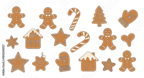A delicious set of isolated Christmas gingerbread cookies decorated with white icing, including various festive holiday shapes.