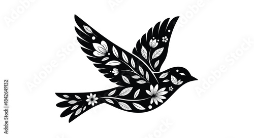 An elegant black silhouette of a flying dove or bird with its wings and body filled with an intricate white floral pattern.