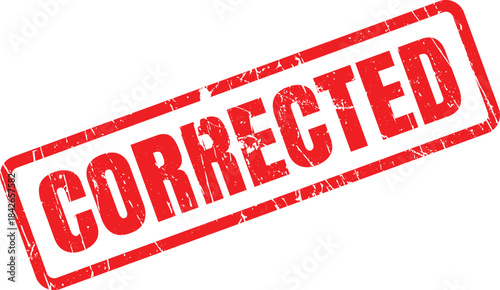 A textured red rubber stamp with the word CORRECTED displayed diagonally across a clean white background