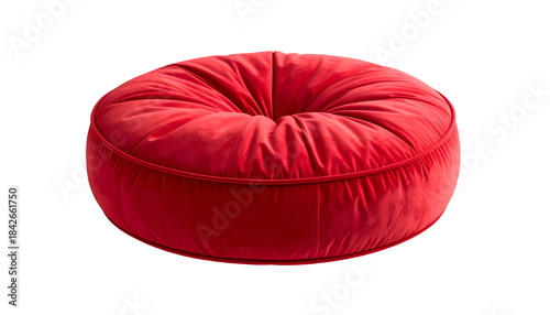 A plush, crimson-red, donut-shaped, padded cushion, against a stark black background