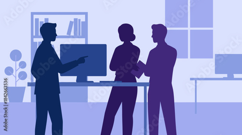 Three business people silhouettes in a modern office discussing a project, with one colleague pointing at the computer monitor during a team meeting