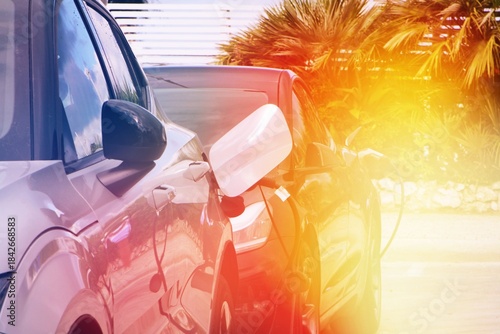 Automobiles charging concept of sustainable future transportation.