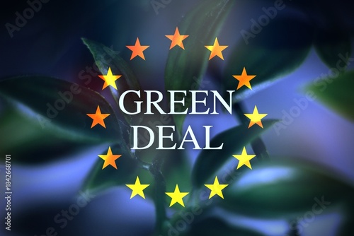 sign GREEN DEAL, blurry background leaf, sustainability, renewable energies.