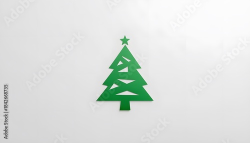 Minimalist Green Paper Cut Christmas Tree Silhouette with Star on Clean White Background