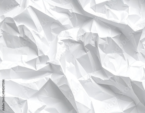 Wrinkled white paper with stark shadows and highlights