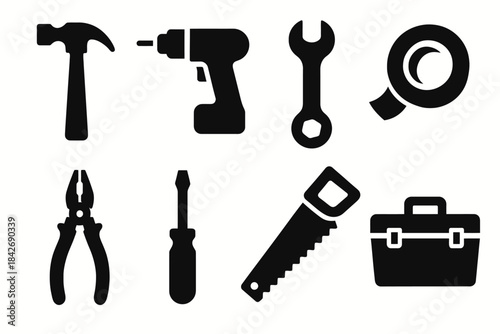Set of black silhouette tools: hammer, drill, wrench, tape, pliers, screwdriver, saw, toolbox