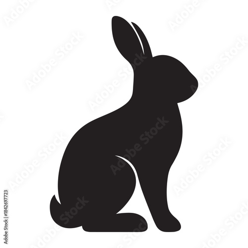 Black silhouette of a rabbit sitting upright with long ears