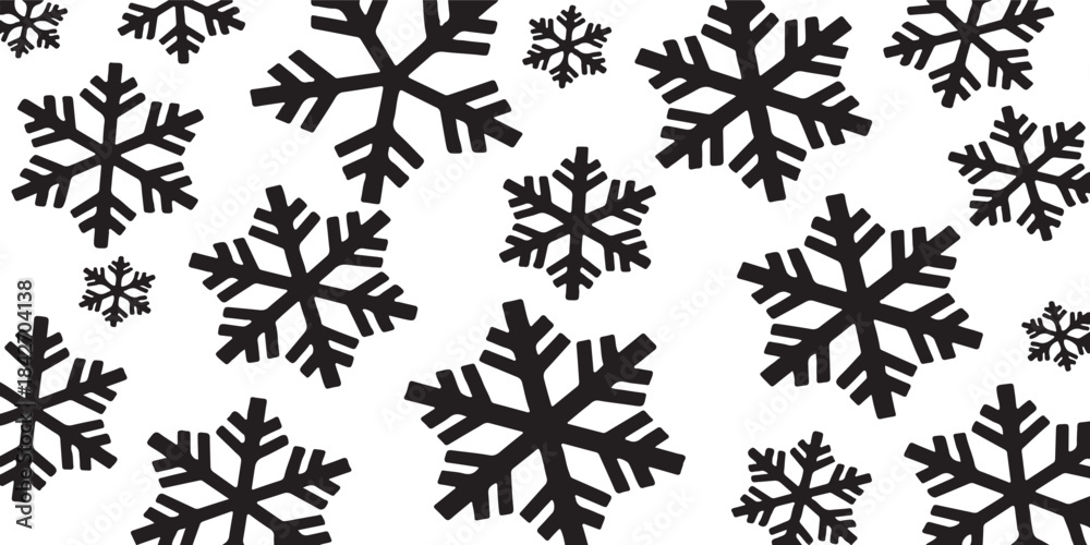 Fototapeta premium Abstract Black and White Graphic Pattern of Assorted Sized Snowflakes Scattered for Winter or Holiday Background.